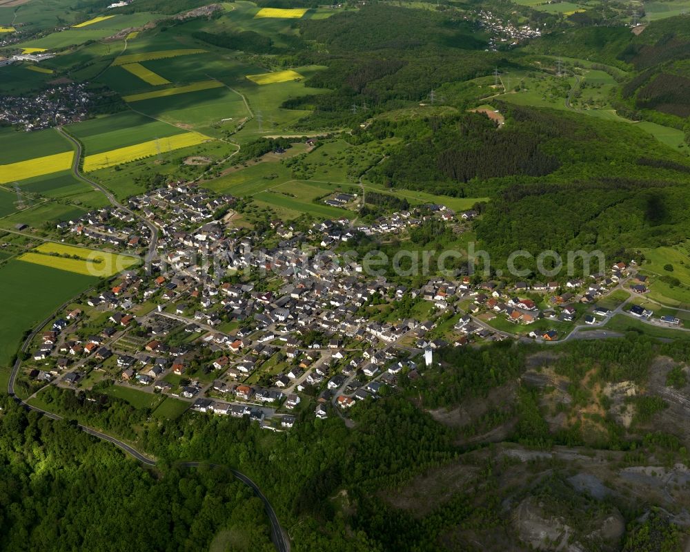 Brohl-Lützing from above - View of the Niederluetzingen part of Brohl-Luetzing and its surrounding landscape in the state of Rhineland-Palatinate. Niederluetzingen is located in the North of the borough, close to the federal highway 412. Its residential area is agriculturally informed and surrounded by fields and forest