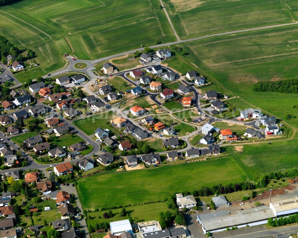 Aerial image Nentershausen - View of the North of Nentershausen in the state of Rhineland-Palatinate. The borough and municipiality is located in the county district of Westerwaldkreis in the South of the low mountain range of Westerwald. Nentershausen is surrounded by agricultural land, forest and meadows. It includes two hamlets. The North includes residential areas with single family houses