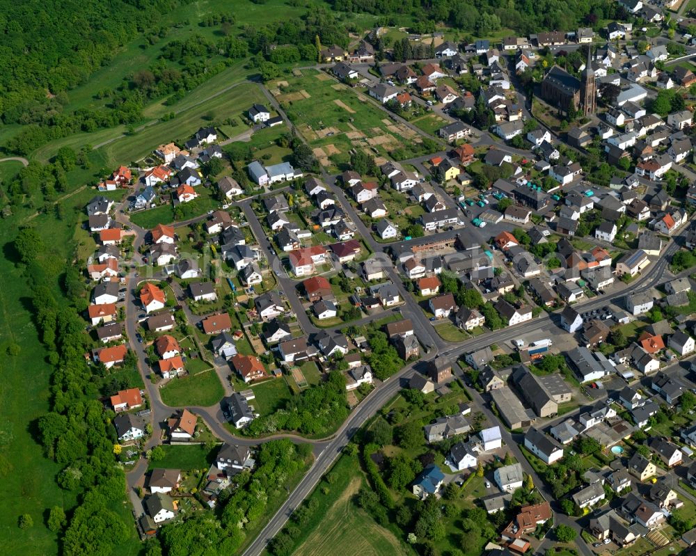 Nentershausen from above - View of the North of Nentershausen in the state of Rhineland-Palatinate. The borough and municipiality is located in the county district of Westerwaldkreis in the South of the low mountain range of Westerwald. Nentershausen is surrounded by agricultural land, forest and meadows. It includes two hamlets. The North includes residential areas with single family houses