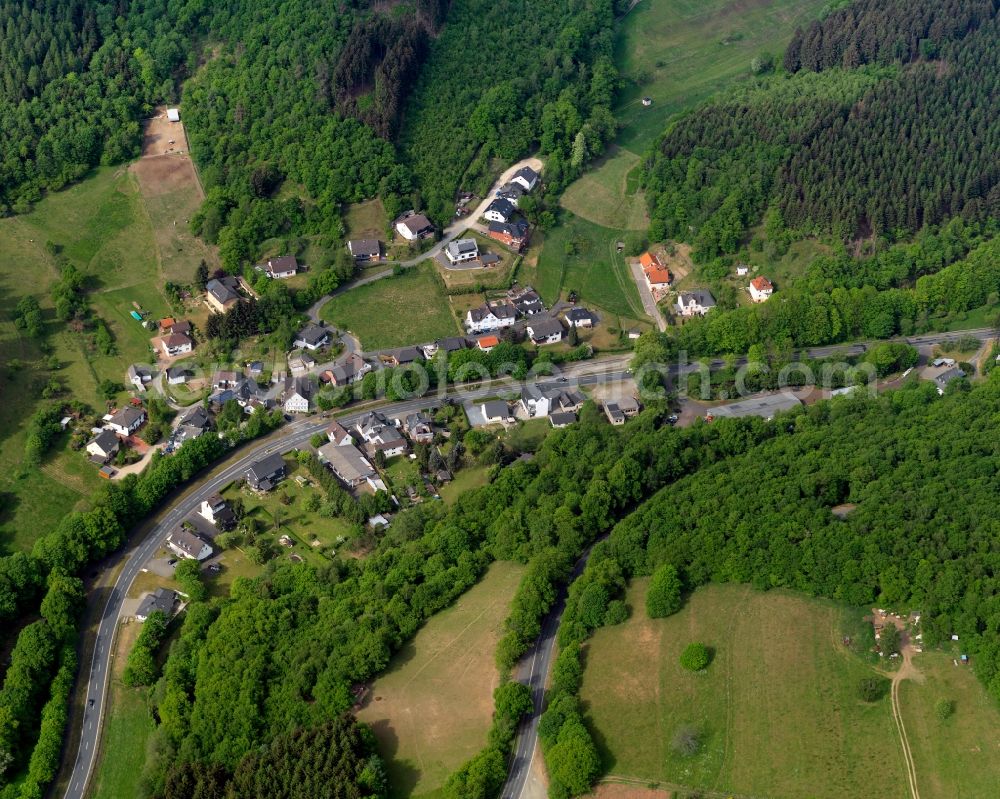 Niederfischbach from above - View of the Oberasdorf part of Niederfischbach in the state of Rhineland-Palatinate. Oberasdorf is located in the borough of Niederfischbach and is named after the creek Asdorf. It consists of several residential buildings and is surrounded by fields, meadows and wooded hills