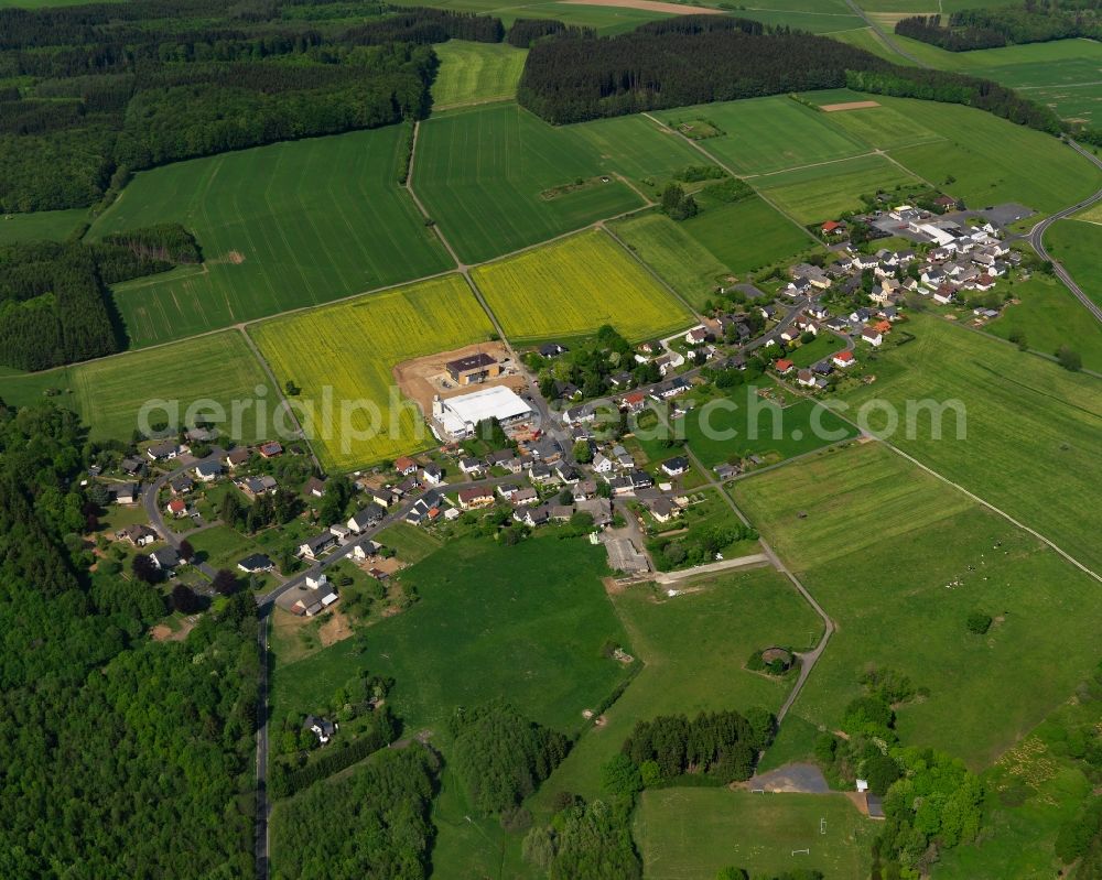 Rothenbach from above - View of the Obersayn part of Rothenbach in the state of Rhineland-Palatinate. The borough and municipiality Rothenbach is located in the county district of Westerwaldkreis and is a rural residential borough. Rothenbach is surrounded by agricultural land, hills and meadows and located on the federal highway B255