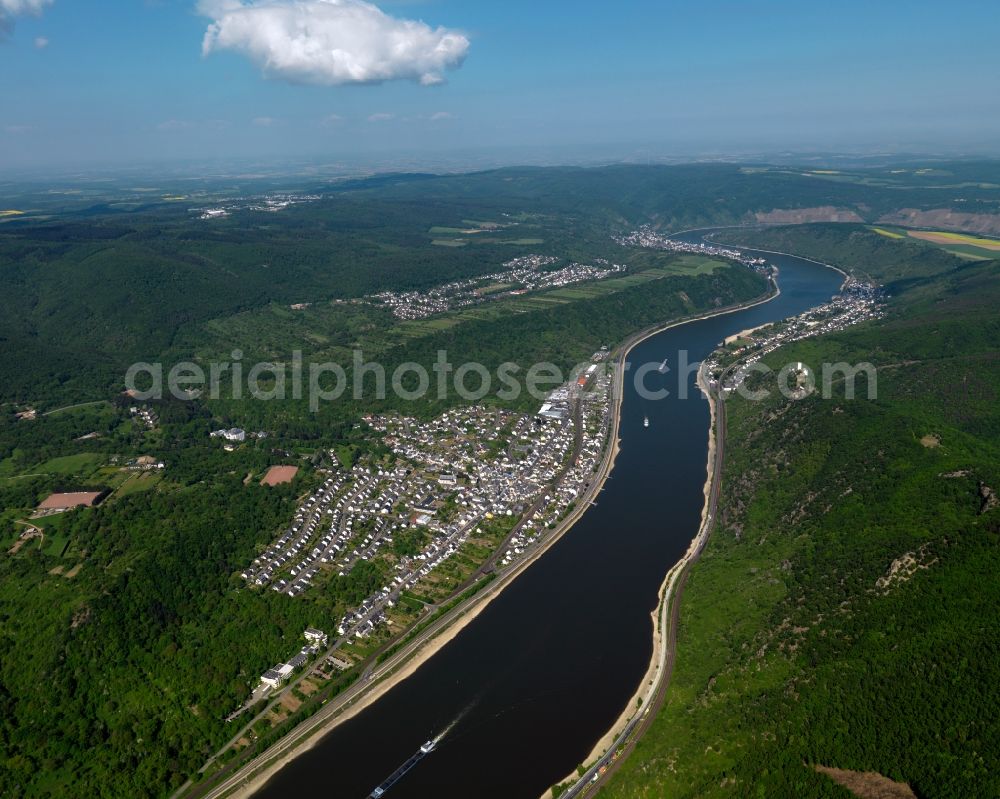 Aerial photograph Boppard - View of the Bad Salzig district of Boppard in the state Rhineland-Palatinate. The town is located in the county district of Rhine-Hunsrueck on the steep left riverbank of the river Rhine. The official tourist resort sits in the UNESCO world heritage site of Upper Middle Rhine Valley and is characterised by vineyards and wine-growing estates. Bad Salzig is located in the South of the town centre