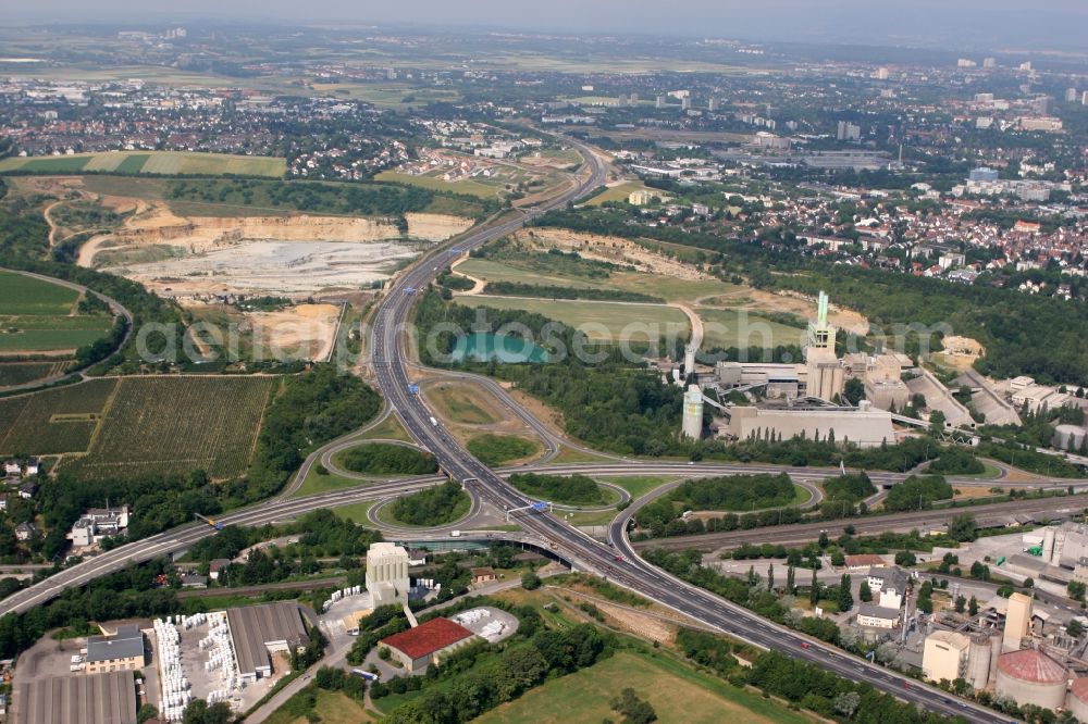 Aerial photograph Mainz - View of the district of Weisenau in Mainz in the state of Rhineland-Palatinate. The motorway junction of the federal motorway A60 and the federal highway 9 as well as the site of the former Portland cement plant and the current plant of the Heidelberg Cement AG are visible