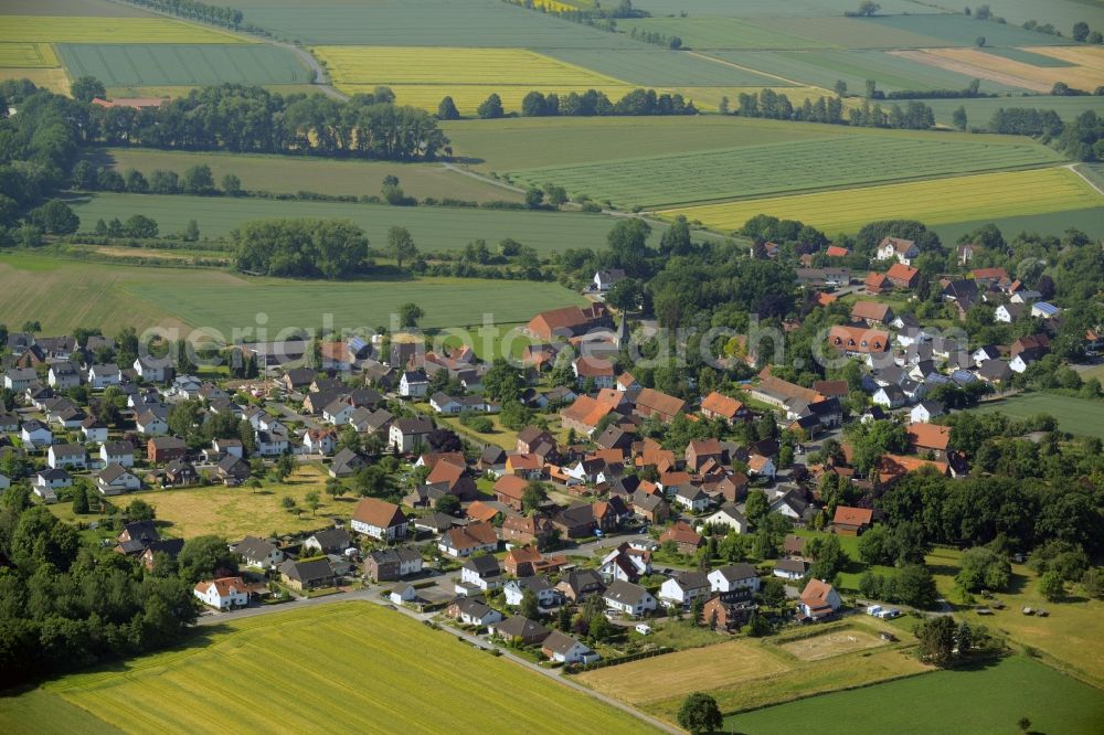 Aerial image Welver - View of the Borgeln part of the borough of Welver in the state of North Rhine-Westphalia. The borough is located in the county district of Soest. The village is surrounded by forest, hills and fields and consists mainly of single family houses. It is located in the Southwest of the main village