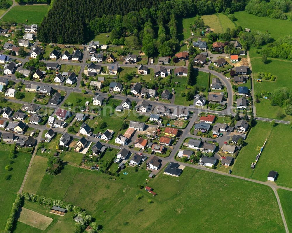 Aerial image Höhn - View of the Neuhochstein part of the borough of Hoehn in the state of Rhineland-Palatinate. The borough is located in the county district and region of Westerwald. The residential village is surrounded by fields and meadows. It sits right on federal highway B255 and consists of several parts. Neuhochstein is located on a forest in the West of the core village