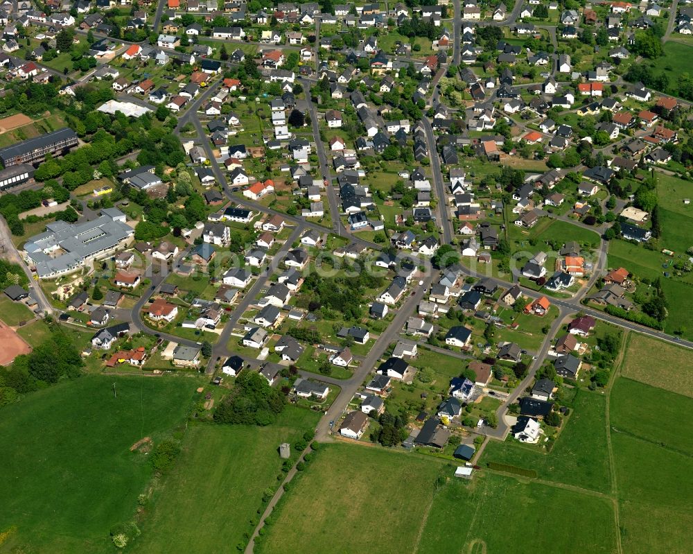 Aerial photograph Höhn - View of the Oellingen part of the borough of Hoehn in the state of Rhineland-Palatinate. The borough is located in the county district and region of Westerwald. The residential village is surrounded by fields and meadows. It sits right on federal highway B255 and consists of several parts