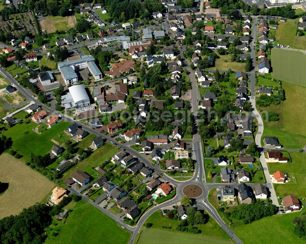 Aerial image Asbach - View of the East of Asbach in the state of Rhineland-Palatinate. The borough and municipiality Asbach is located in the county district of Neuwied in the Westerwald forest region and surrounded by fields, meadows and hills. The borough sits between the nature parks of Rhine-Westerwald and Bergisches Land. Konrad-Adenauer-School sits on the edge of the borough