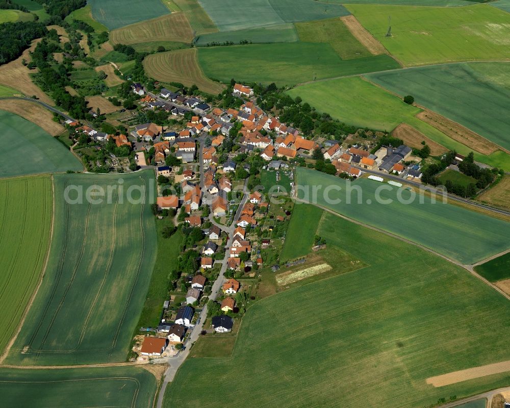 Becherbach from the bird's eye view: View of the Roth part of the borough and municipiality of Becherbach in the state of Rhineland-Palatinate. The agricultural borough is located in the county district of Bad Kreuznach. Surrounded by fields, hills and forest, the village with its parts and hamlets is located in the Palatinate region