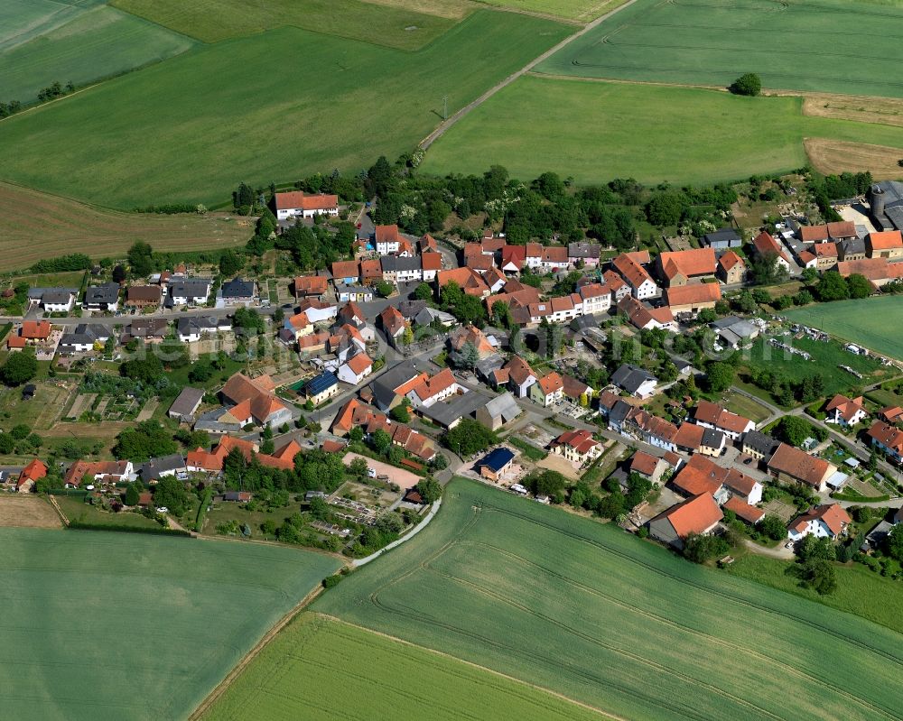 Becherbach from above - View of the Roth part of the borough and municipiality of Becherbach in the state of Rhineland-Palatinate. The agricultural borough is located in the county district of Bad Kreuznach. Surrounded by fields, hills and forest, the village with its parts and hamlets is located in the Palatinate region