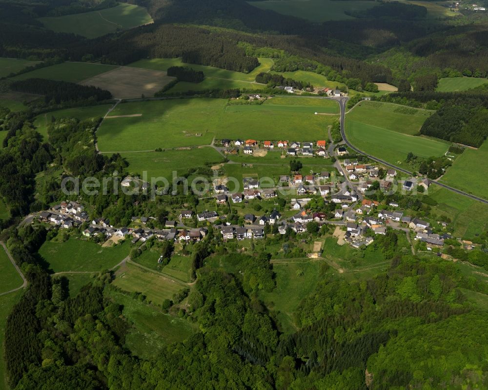 Oberdürenbach from above - View of the borough of Oberduerenbach in the state of Rhineland-Palatinate. The borough is located in the East Eifel region, surrounded by fields, agricultural land and forest and mainly consists of residential buildings and agricultural businesses or farms. Schelborn is located in the West of the borough