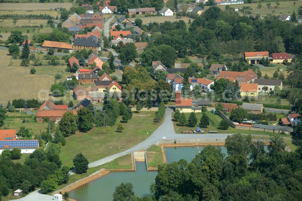 Schlabendorf am See from above - View of Schlabendorf am See on Lake Schlabendorf in the state of Brandenburg. The village is located on the Northeastern shore of the lake where the marina with its harbour is located