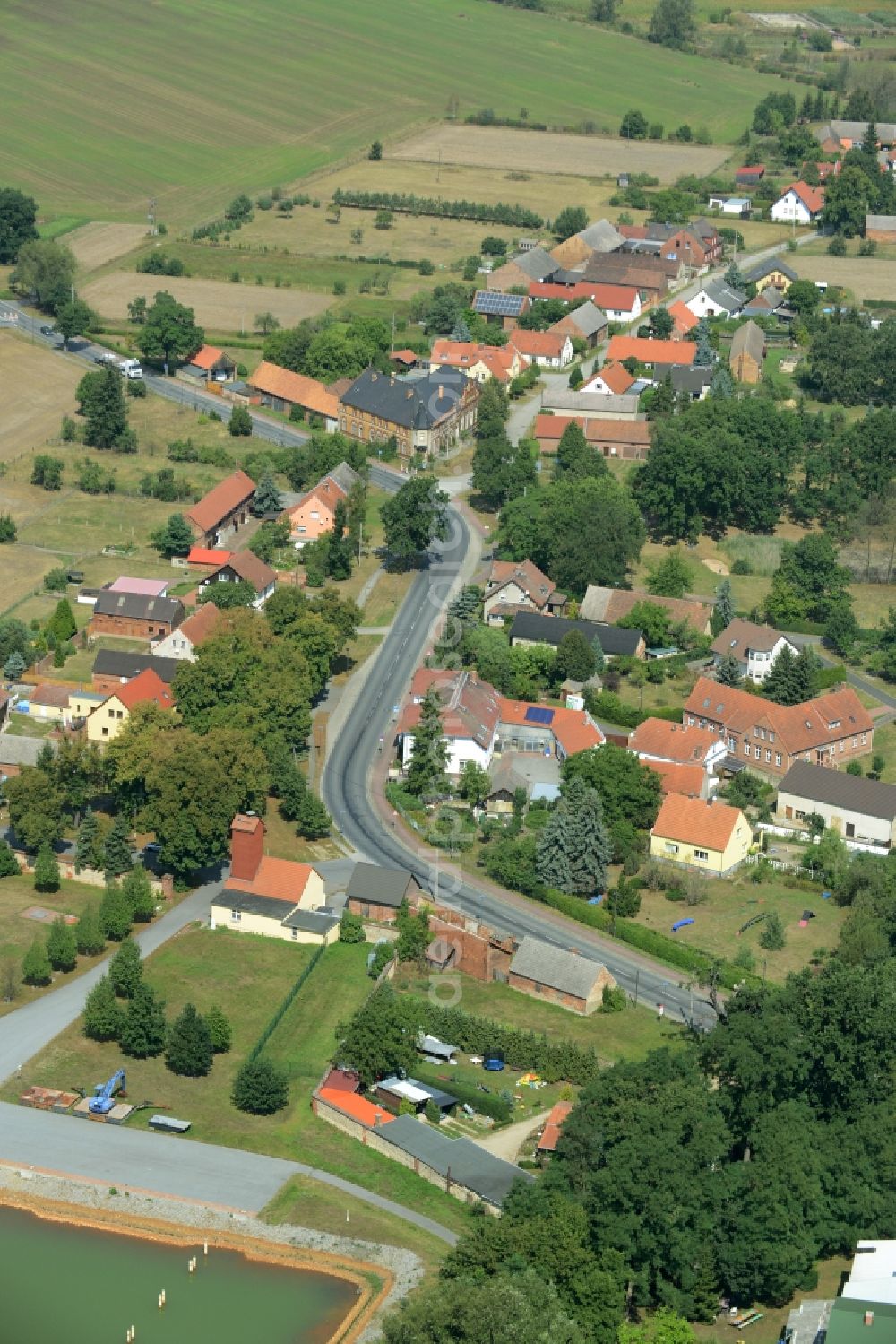 Schlabendorf am See from above - View of Schlabendorf am See on Lake Schlabendorf in the state of Brandenburg. The village is located on the Northeastern shore of the lake where the marina with its harbour is located