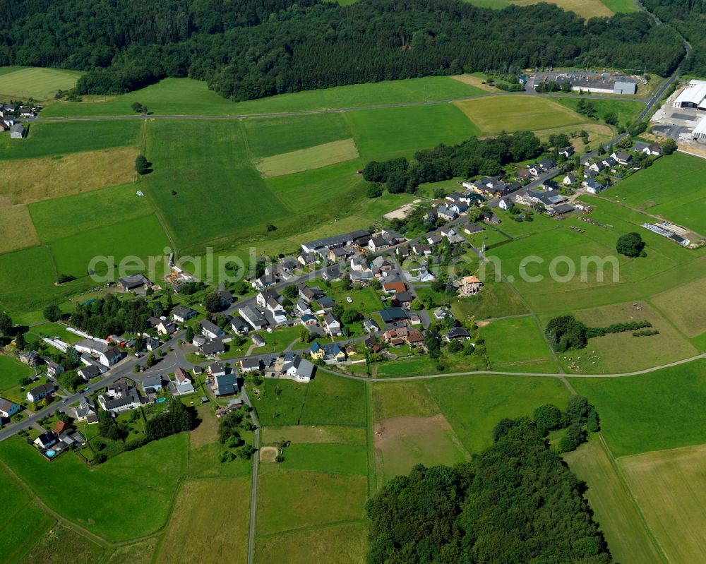 Aerial image Asbach - View of the Schoeneberg part of Asbach in the state of Rhineland-Palatinate. The borough and municipiality Asbach is located in the county district of Neuwied in the Niederwesterwald forest region between the Nature parks Rhine-Westerwald and Bergisches Land. Schoeneberg is lcoated in the East of the core village on a hill above the valleys of Krumbach and Mehrbach creeks. It is agriculturally informed and consists of fields, residential buildings and farms