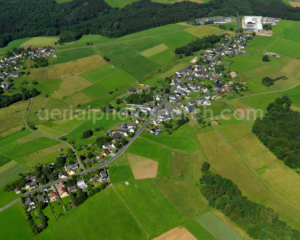 Aerial image Asbach - View of the Schoeneberg part of Asbach in the state of Rhineland-Palatinate. The borough and municipiality Asbach is located in the county district of Neuwied in the Niederwesterwald forest region between the Nature parks Rhine-Westerwald and Bergisches Land. Schoeneberg is lcoated in the East of the core village on a hill above the valleys of Krumbach and Mehrbach creeks. It is agriculturally informed and consists of fields, residential buildings and farms