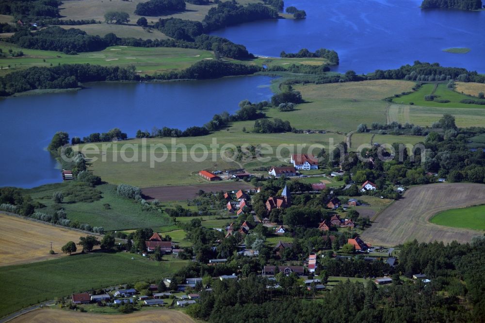 Kuchelmiß from above - View of the Serrahn part of the Krakow Lake District in the borough of Kuchelmiss in the state of Mecklenburg - Western Pomerania. The landscape consists of several lakes and islands. Serrahn is located on the shore of Lake Serrahner See and Krakow Untersee in the background