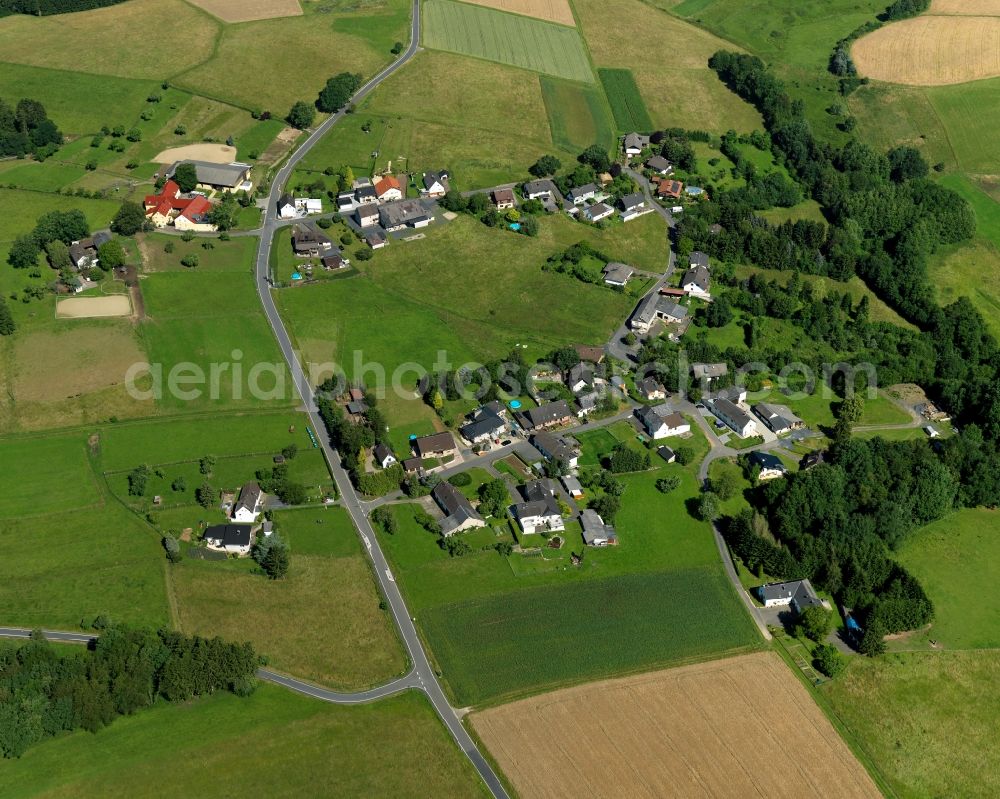 Aerial image Asbach - View of the Sessenhausen part of Asbach in the state of Rhineland-Palatinate. The borough and municipiality Asbach is located in the county district of Neuwied in the Niederwesterwald forest region between the Nature parks Rhine-Westerwald and Bergisches Land. Sessenhausen today is a residential village with single and multi-family homes