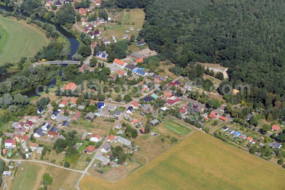 Rietz-Neuendorf from above - View of the village of Neubrueck in the East of the borough of Rietz-Neuendorf in the state of Brandenburg. The residential village is surrounded by fields and forest along Spreestrasse