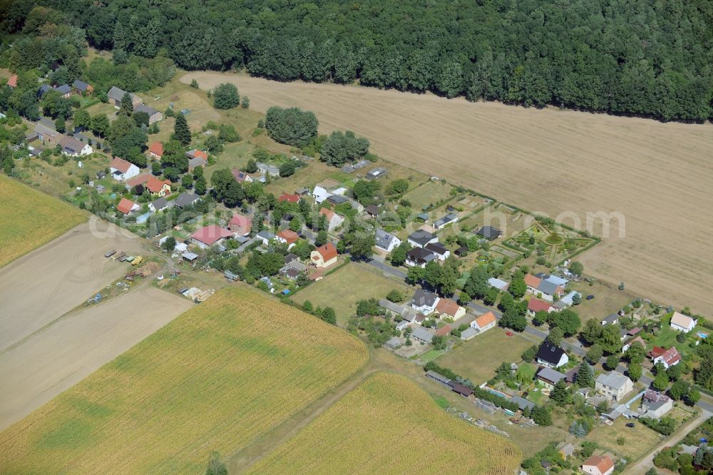 Aerial image Rietz-Neuendorf - View of the village of Neubrueck in the East of the borough of Rietz-Neuendorf in the state of Brandenburg. The residential village is surrounded by fields and forest along Spreestrasse