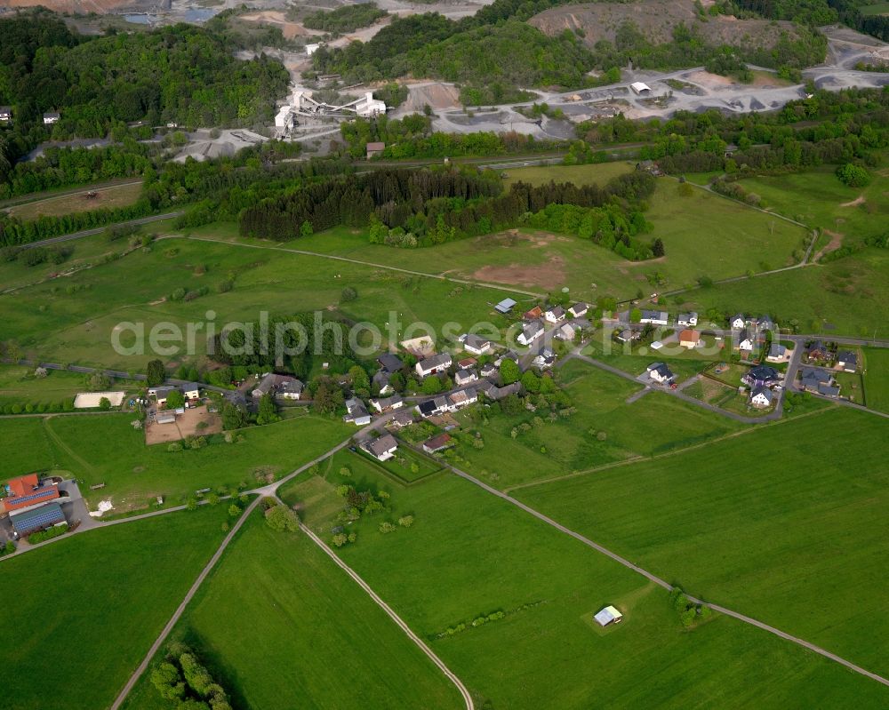 Rotenhain from above - View of the Todtenberg part of Rotenhain in the state of Rhineland-Palatinate. The borough and municipiality Rotenhain is located in the county district of Westerwaldkreis and surrounded by fields, meadows and forest. Rotenhain includes the Todtenberg part - in the North of the borough - and the Old Castle of Rotzenhahn in the West of the village