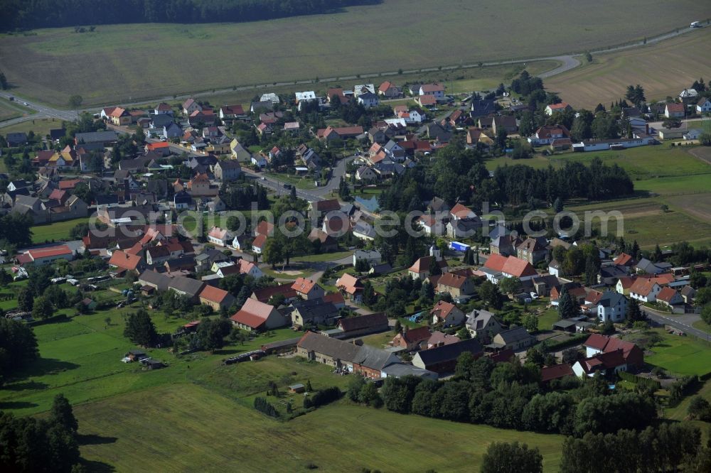 Aerial image Gräfenhainichen - View of the Tornau part of the town of Graefenhainichen in the state of Saxony-Anhalt. The village is located on federal highway B2 in the county district of Wittenberg and consists of single family houses and farms