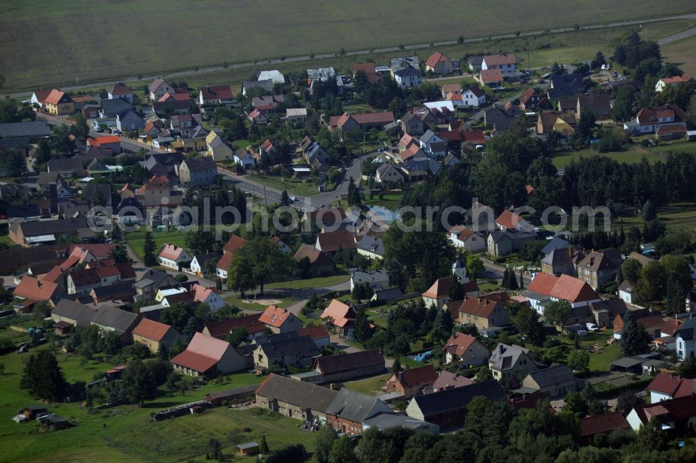 Aerial image Gräfenhainichen - View of the Tornau part of the town of Graefenhainichen in the state of Saxony-Anhalt. The village is located on federal highway B2 in the county district of Wittenberg and consists of single family houses and farms