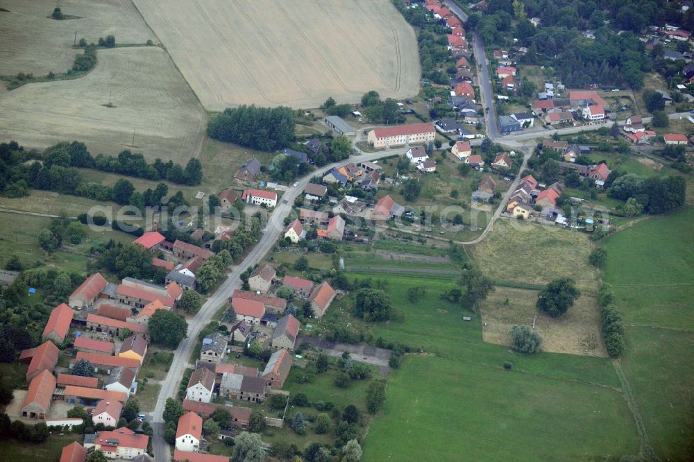 Aerial photograph Nuthetal - View of the Tremsdorf part of the borough of Nuthetal in the state Brandenburg. Tremsdorf is an agricultural village sitting on a county road in the county district of Potsdam-Mittelmark. It is located on the edge of the Nature protection area of Nuthe-Nieplitz-Niederung