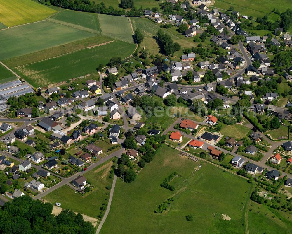 Aerial photograph Schauren - View of the West of Schauren in the state of Rhineland-Palatinate. The borough and municipiality is located in the county district of Birkenfeld, at Idar Forest in the Hunsrueck region. It is surrounded by agricultural land, meadows and forest. The hamlets Aschieder Mill and Schaurener Mill belong to the borough