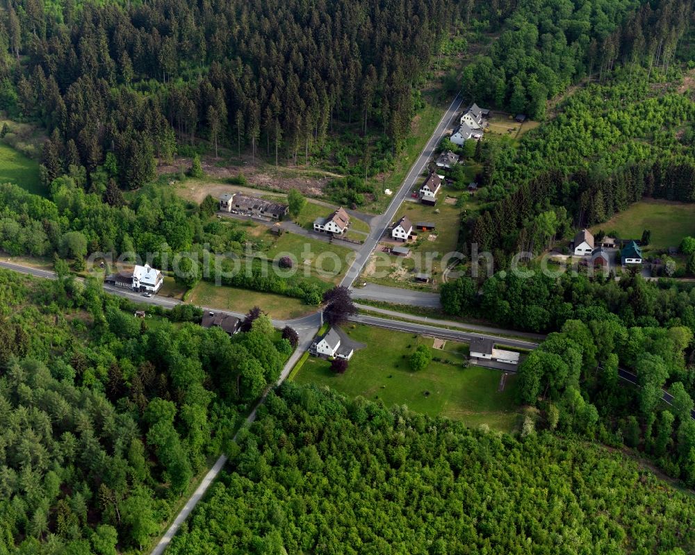 Friesenhagen from above - View of Wildenburg train station in the state of Rhineland-Palatinate. It is surrounded by hills, fields and wooded areas