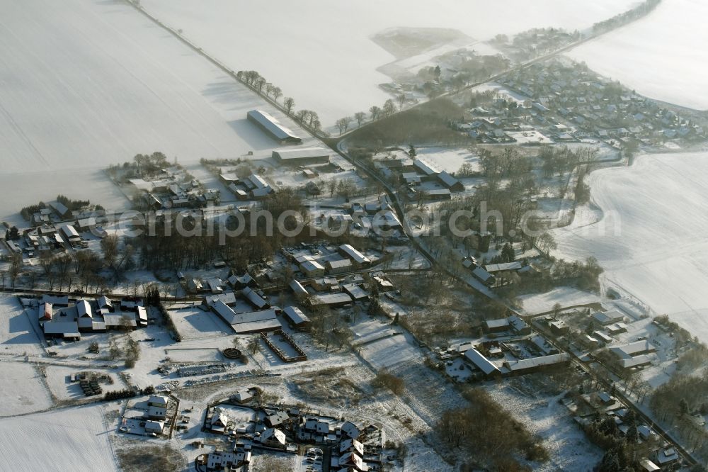 Altlandsberg from the bird's eye view: View of the winterly and snow covered village of Wegendorf in Altlandsberg in the state of Brandenburg