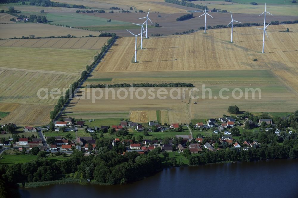 Aerial photograph Zehdenick - View of the village of Zabelsdorf in Zehdenick in the state of Brandenburg. The village is surrounded by fields and meadows and located on the Southern shore of the Lake Grosser Wentowsee