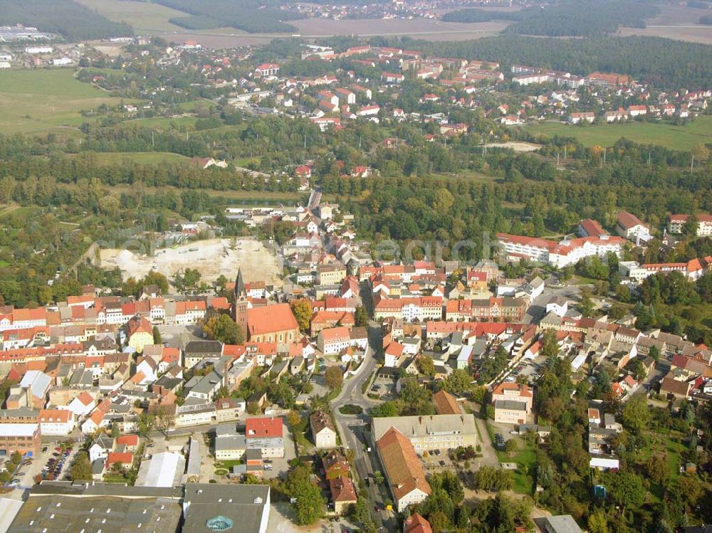 Aerial photograph Bad Liebenwerda - Blick auf das Stadtzentrum von Bad Liebenwerda mit dem Rathaus und der gegenüberliegenden Spätgotischen St. Nikolai Kirche mit neugotischem Turm und Inventar. Stadtverwaltung, Stadt Bad Liebenwerda, Postfach 1153 , 04920 Bad Liebenwerda