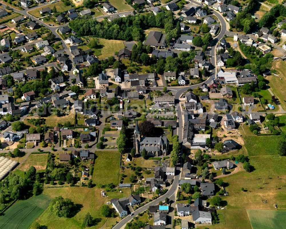 Landkern from above - View of the centre of Landkern in the state of Rhineland-Palatinate. The borough and municipiality is an official tourist resort and located in the county district of Cochem-Zell on the edge of the Endert valley. Landkern is surrounded by agricultural land and meadows and includes several small estates and hamlets