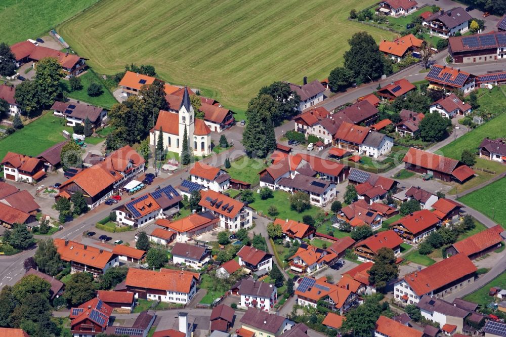 Aerial image Sindelsdorf - Church building in the village of in Sindelsdorf in the state Bavaria