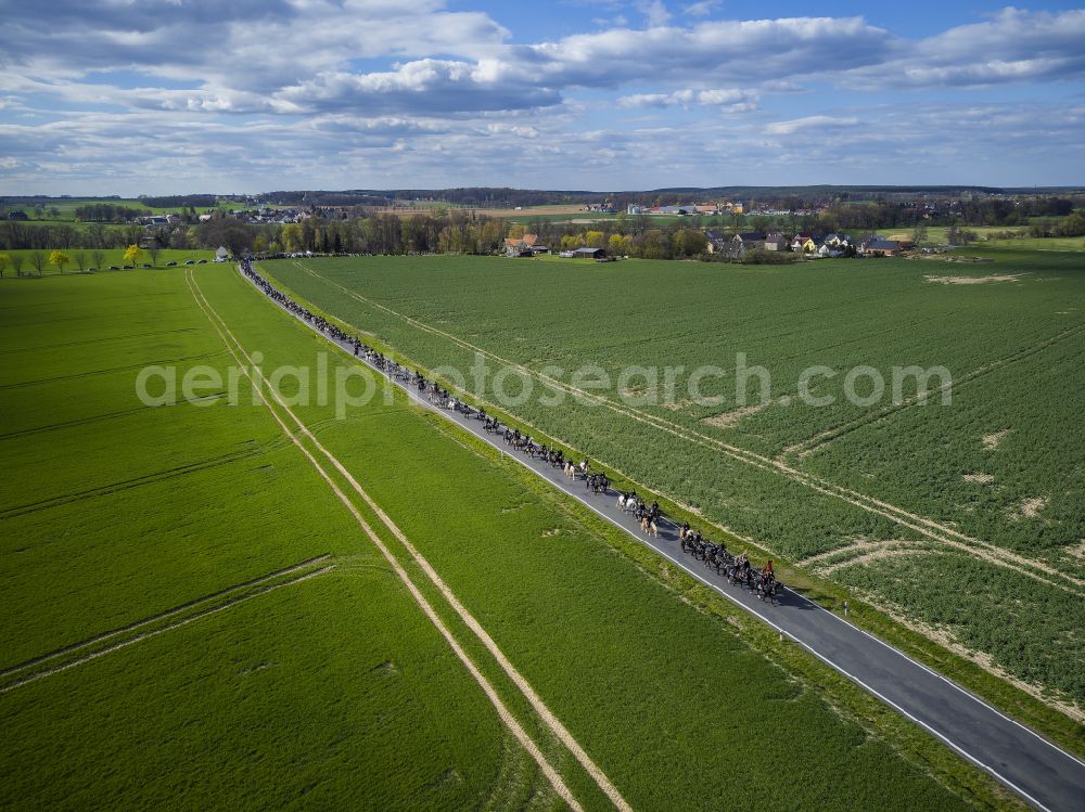 Crostwitz from the bird's eye view: Easter rider procession from Panschwitz Kuckau to Hoeflein, Raeckelwitz to Crostwitz in the state of Saxony, Germany