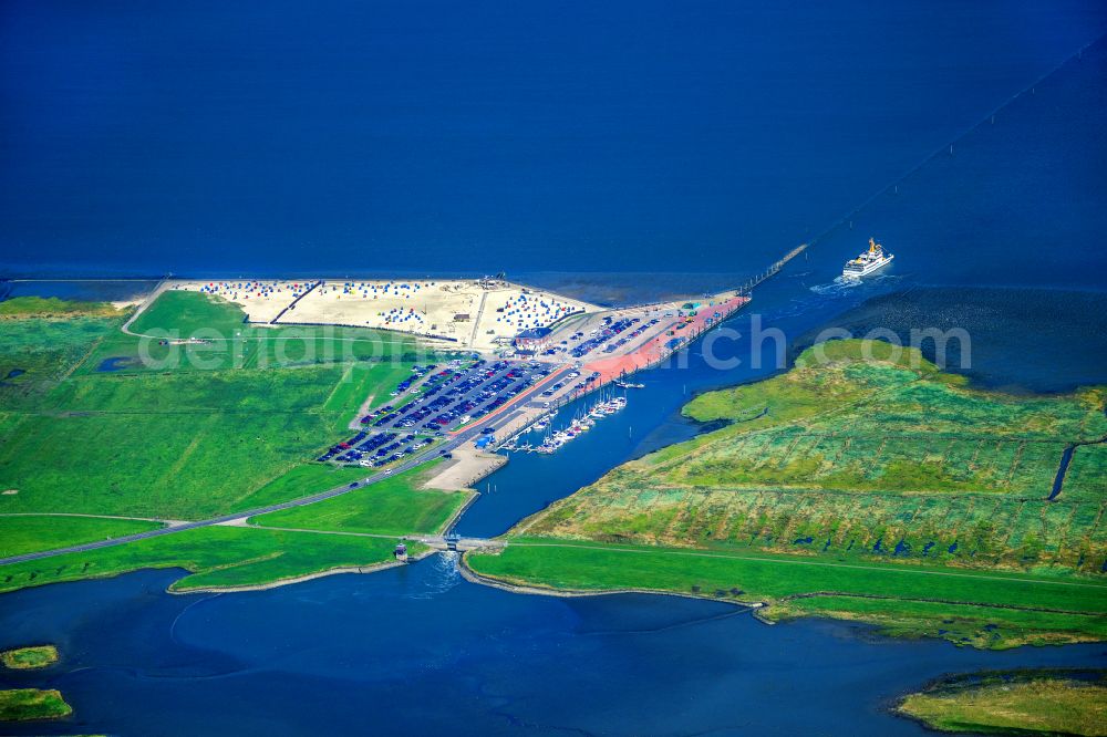 Dornum from above - East Frisian coast near Nessmersiehl in the state of Lower Saxony. The community Dorum is located in Ostfriesland on the North Sea coast. Along the coastline extends the Lower Saxony Wadden Sea National Park, which has been a UNESCO World Heritage Site since 2009. The landscape is characterized by the Wadden Sea, agriculture and fields