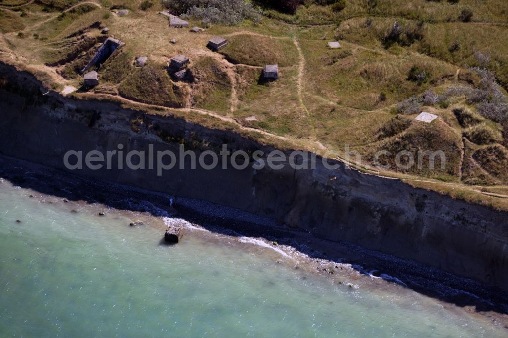 Wustrow from above - Coastline at the rocky cliffs of Ruins of the old bunker plant in Wustrow in the state Mecklenburg - Western Pomerania