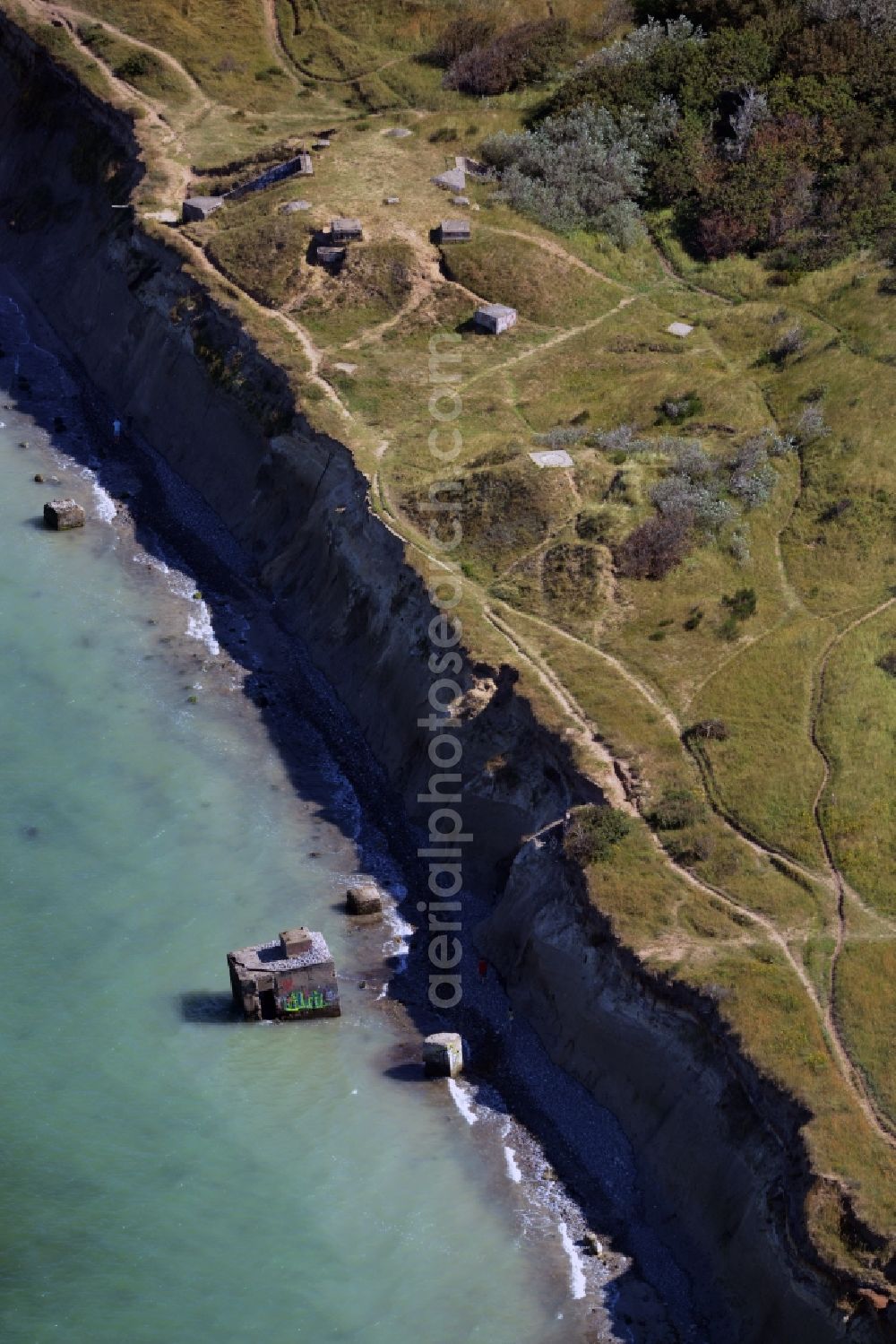 Aerial image Wustrow - Coastline at the rocky cliffs of Ruins of the old bunker plant in Wustrow in the state Mecklenburg - Western Pomerania