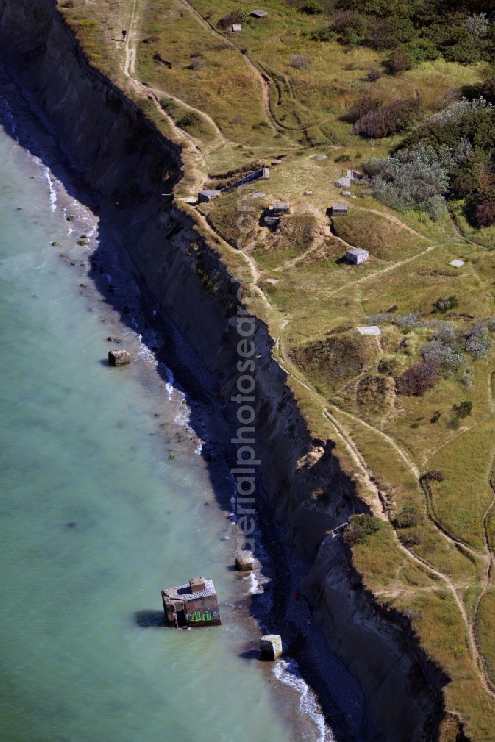 Aerial photograph Wustrow - Coastline at the rocky cliffs of Ruins of the old bunker plant in Wustrow in the state Mecklenburg - Western Pomerania