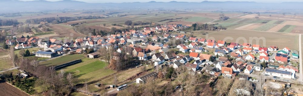 Aerial image Niederotterbach - Panoramic perspective of Village - view on the edge of agricultural fields and farmland in the district Kleinsteinfeld in Niederotterbach in the state Rhineland-Palatinate, Germany