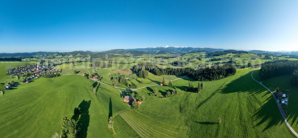 Sulzberg from above - Panoramic perspective forest areas in with meadow landscape on street Dorf in Sulzberg in Vorarlberg, Austria