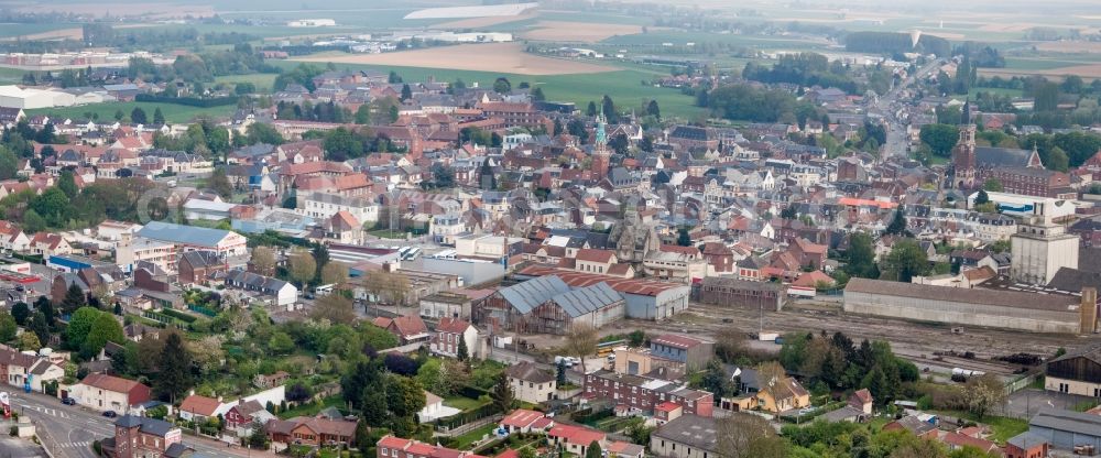 Bapaume from above - Panoramic perspective Town View of the streets and houses of the residential areas in Bapaume in Hauts-de-France, France