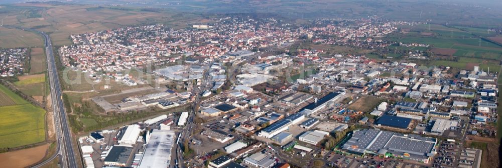 Aerial image Grünstadt - Panoramic perspective Town View of the streets and houses of the residential areas in Gruenstadt in the state Rhineland-Palatinate, Germany