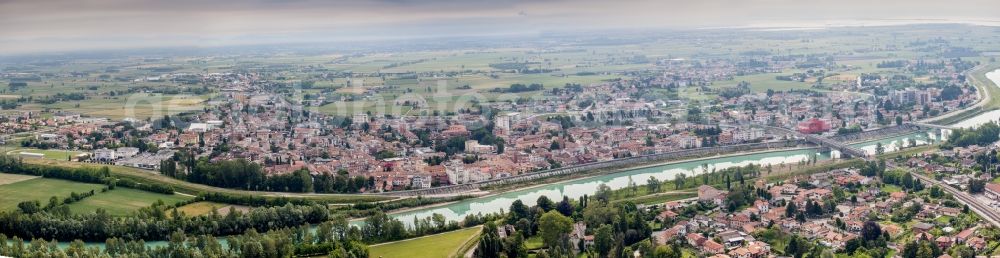 Aerial image Latisana - Panoramic perspective City center in the downtown area on the banks of river course of Tagliamento in Latisana in Friuli-Venezia Giulia, Italy