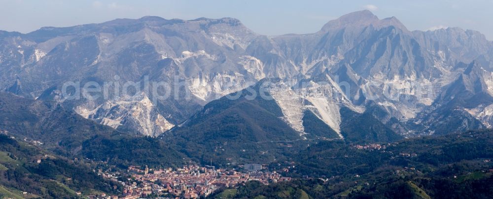 Aerial image Carrara - Quarry for the mining and handling of Marmor in Carrara in Toscana, Italy