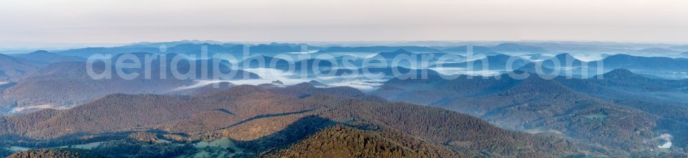 Aerial photograph Dahn - Panoramic perspective of Forest and mountain scenery of the Pfaelzerwald with valleys in morning mist in Dahn in the state Rhineland-Palatinate, Germany