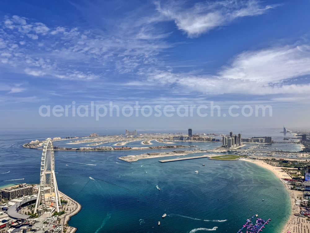 Dubai from above - Panoramic perspective residential house development on the peninsula Palm Jumeirah on street Palm Jumeirah Rd in Dubai in United Arab Emirates
