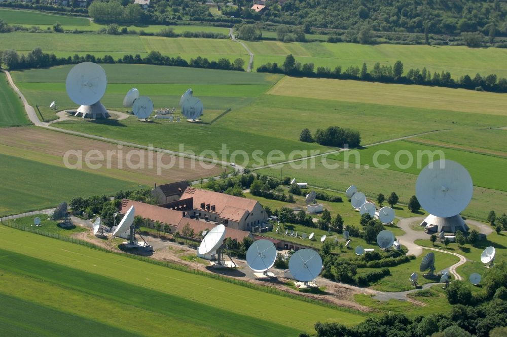 Fuchsstadt from above - Parbola antennas in the form of white satellite dishes on the site of the earth station in Fuchsstadt in the state Bavaria, Germany