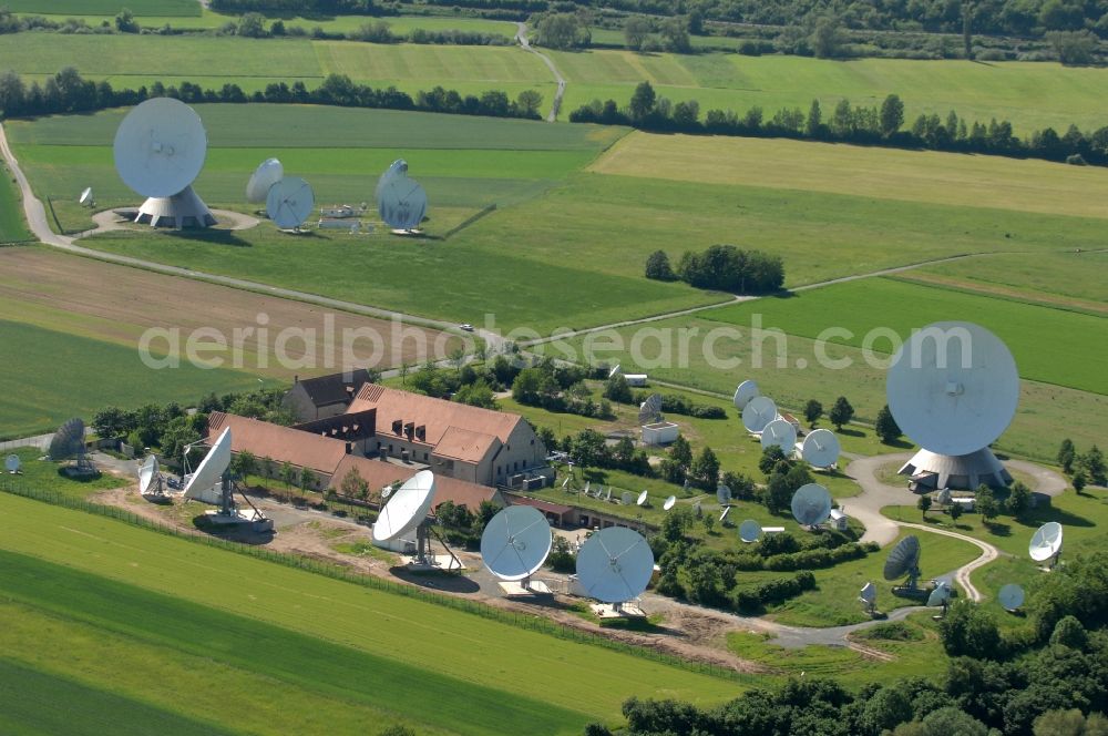 Fuchsstadt from the bird's eye view: Parbola antennas in the form of white satellite dishes on the site of the earth station in Fuchsstadt in the state Bavaria, Germany