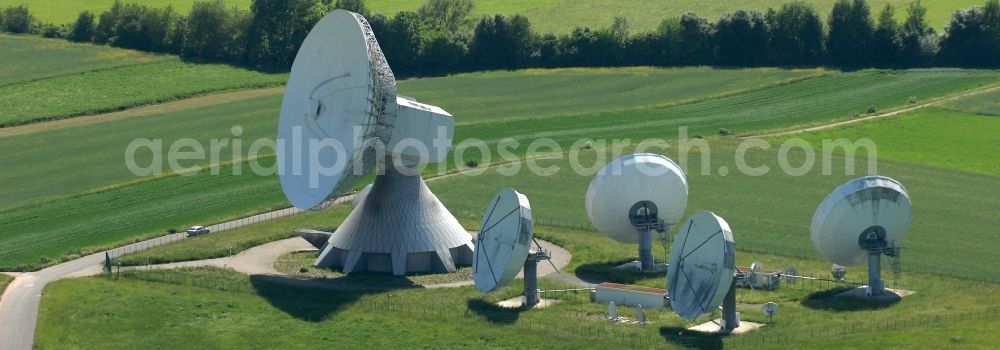 Fuchsstadt from the bird's eye view: Parbola antennas in the form of white satellite dishes on the site of the earth station in Fuchsstadt in the state Bavaria, Germany