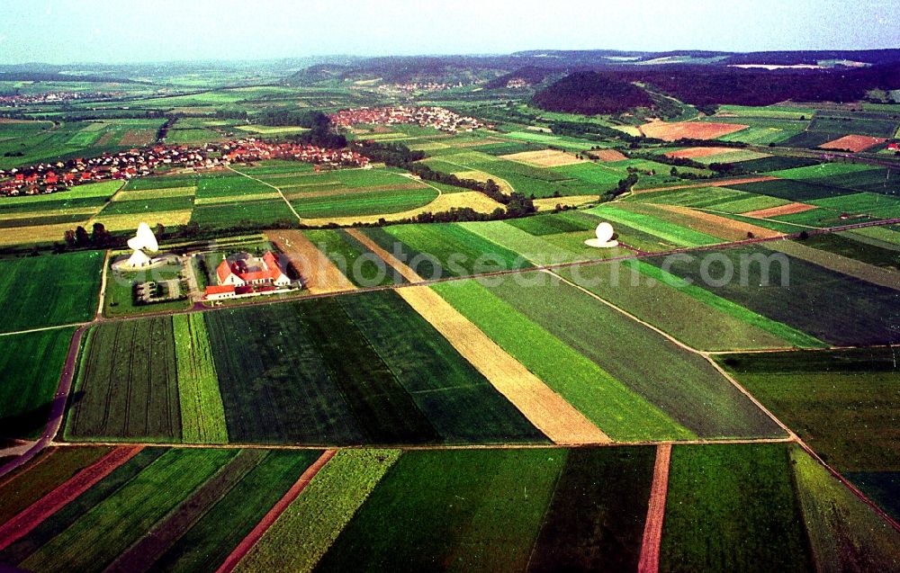 Fuchsstadt from above - Parbola antennas in the form of white satellite dishes on the site of the earth station in Fuchsstadt in the state Bavaria, Germany